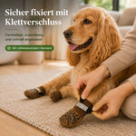 Hundesocken mit verstellbarem Klettverschluss und reflektierendem Element für sicheren und anpassbaren Sitz.